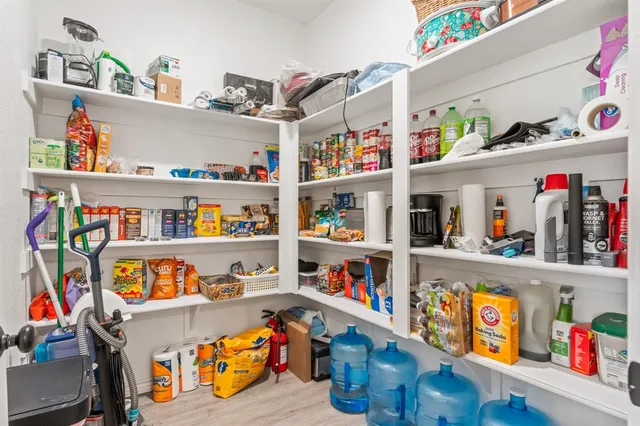 a bedroom with a bed and furniture