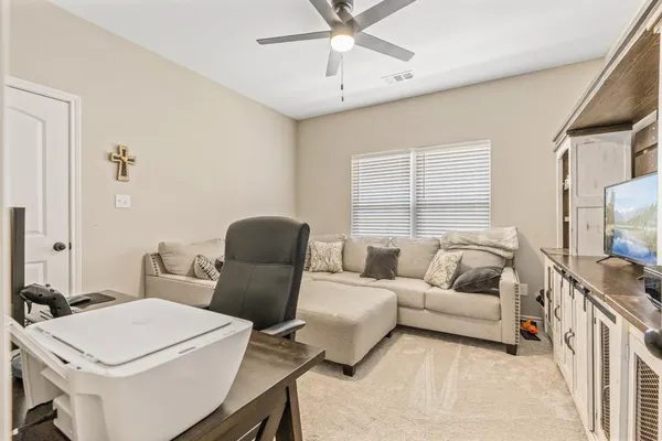 a view of a storage and utility room with a window