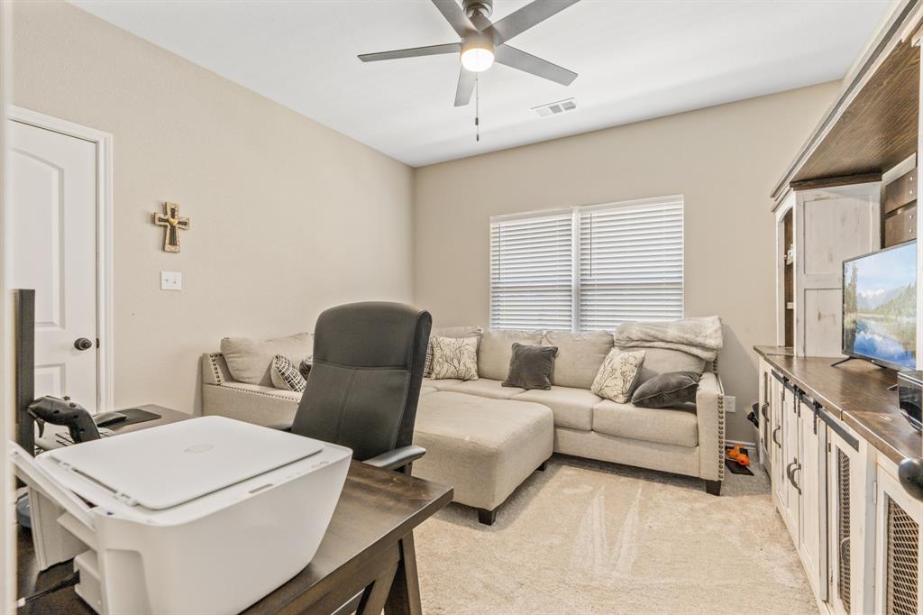 130 Private Road Hillsboro, TX 76645 - Photo 22 of 39 a living room with furniture and a large window