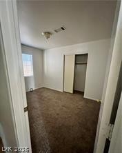 1448 Star Road, Unit 2 Pahrump, NV 89048 - Photo 6 of 10 A well-lit bedroom provides ample space and a neutral canvas for personalization.