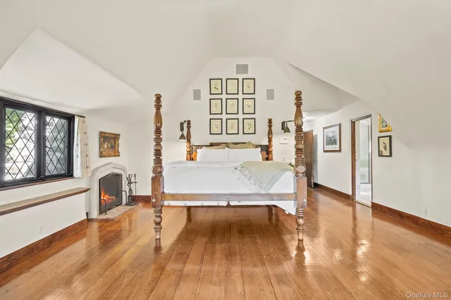 a view of a living room with furniture and a window