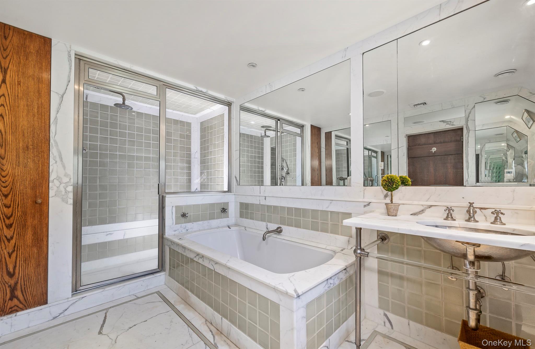 99 Quaker Bridge Road Croton-on-Hudson, NY 10520 - Photo 23 of 50 a bathroom with a sink and a bathtub