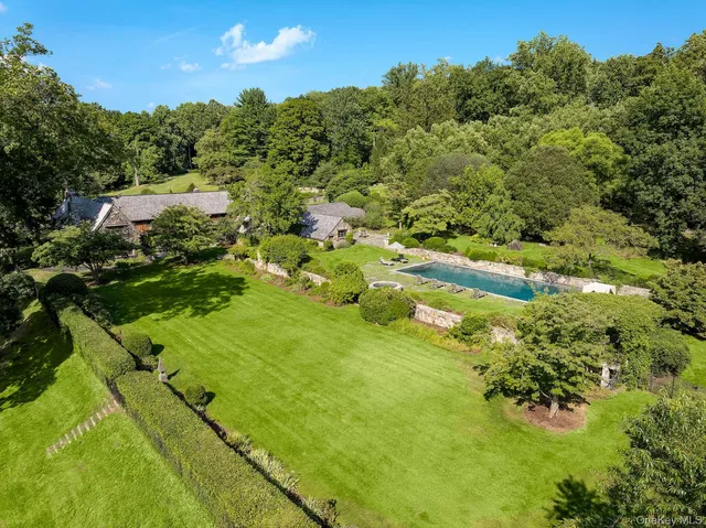 a view of a garden with an ocean