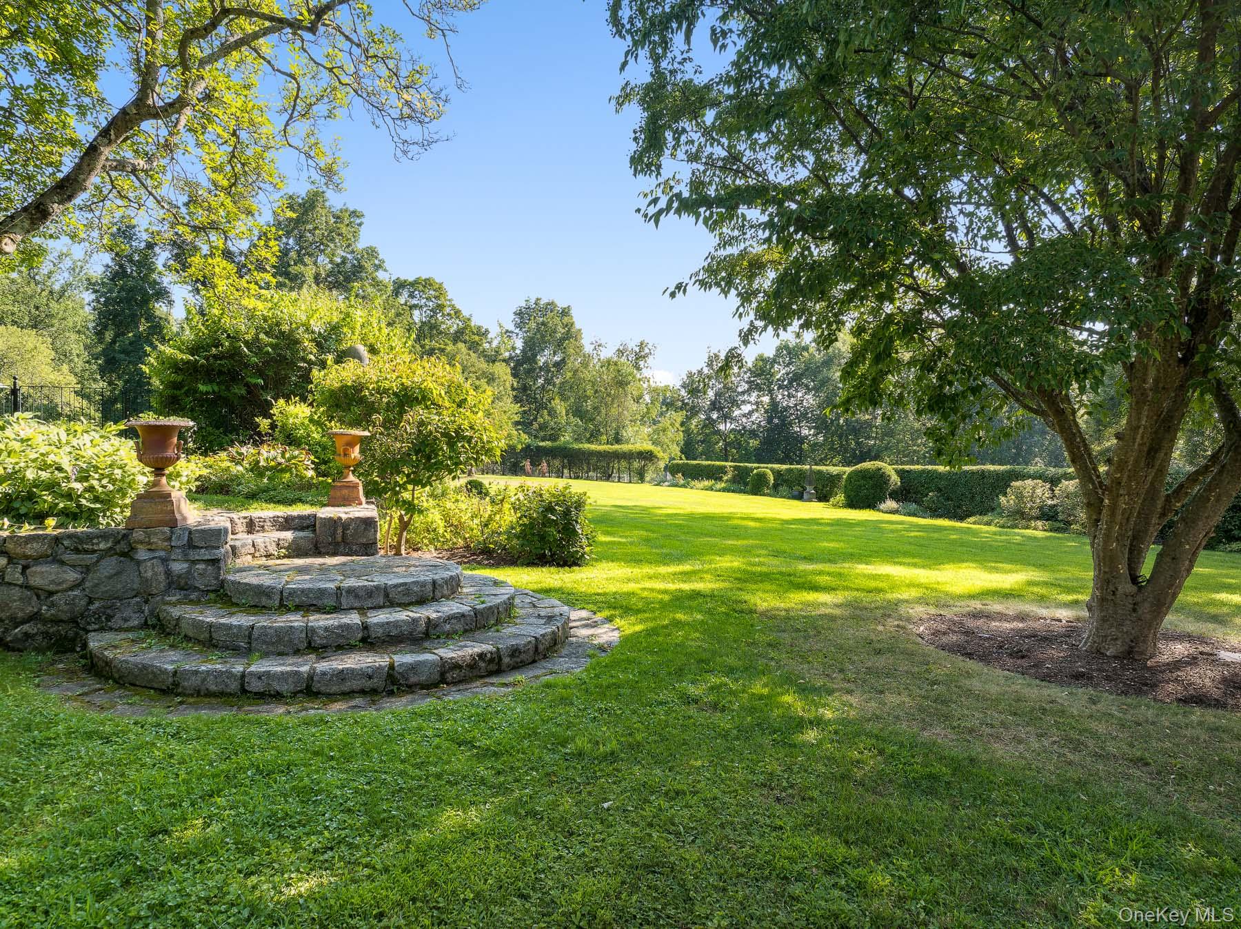 99 Quaker Bridge Road Croton-on-Hudson, NY 10520 - Photo 32 of 50 a view of a house with a big yard