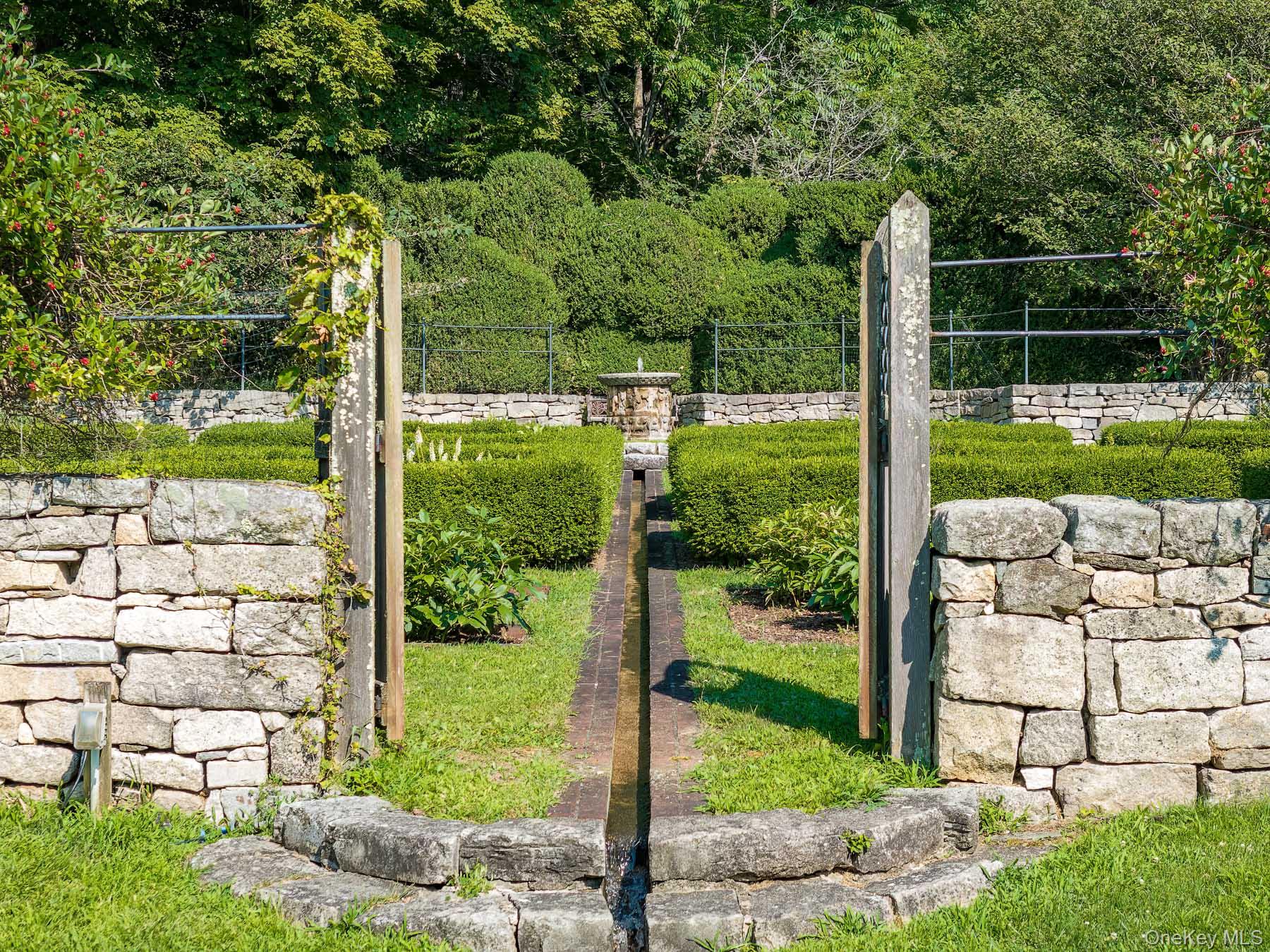 99 Quaker Bridge Road Croton-on-Hudson, NY 10520 - Photo 33 of 50 a view of a yard with a large tree