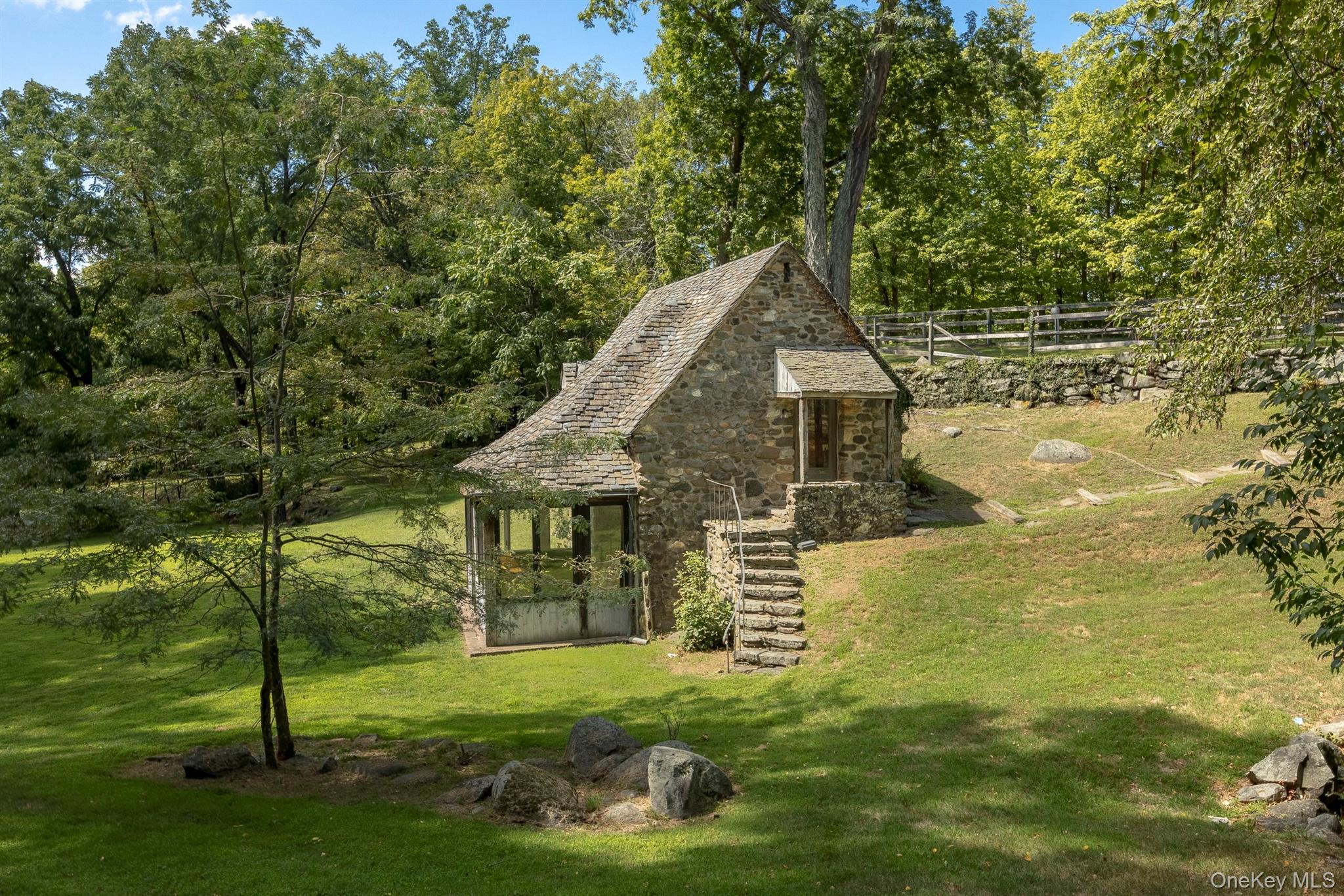 99 Quaker Bridge Road Croton-on-Hudson, NY 10520 - Photo 35 of 50 a aerial view of a house