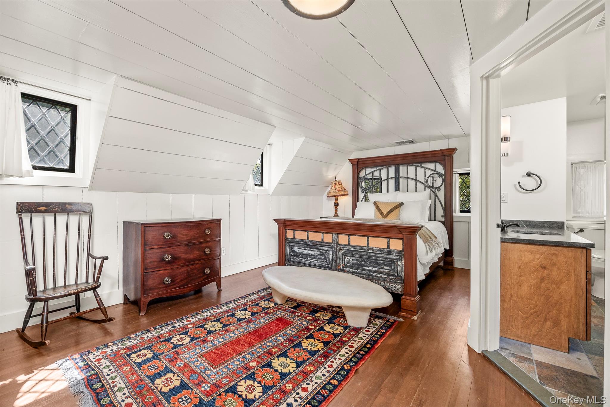 99 Quaker Bridge Road Croton-on-Hudson, NY 10520 - Photo 40 of 50 a bedroom with a bed and a dresser next to a window