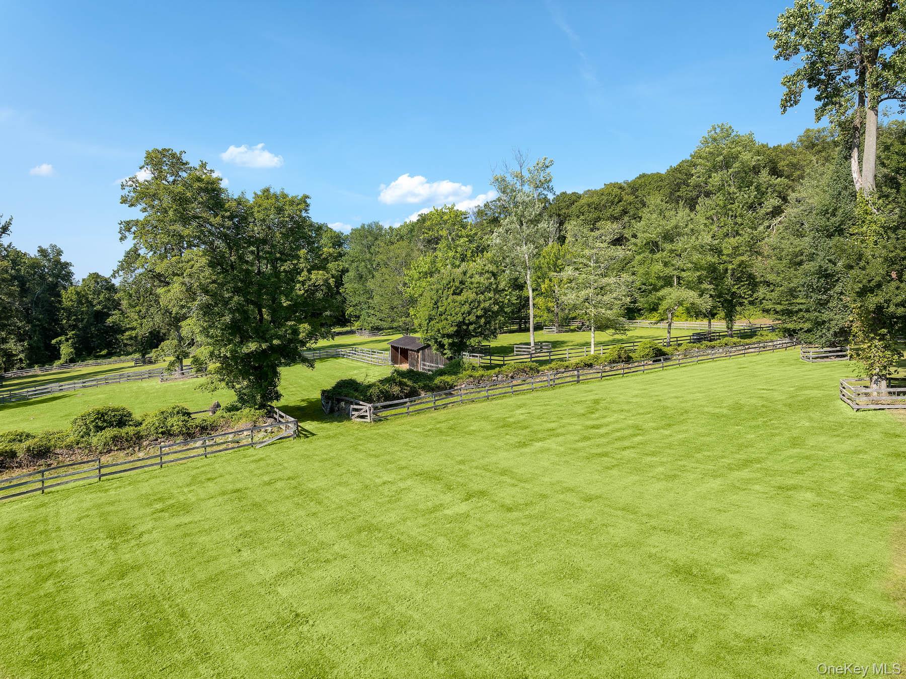 99 Quaker Bridge Road Croton-on-Hudson, NY 10520 - Photo 45 of 50 a view of an outdoor space and a yard