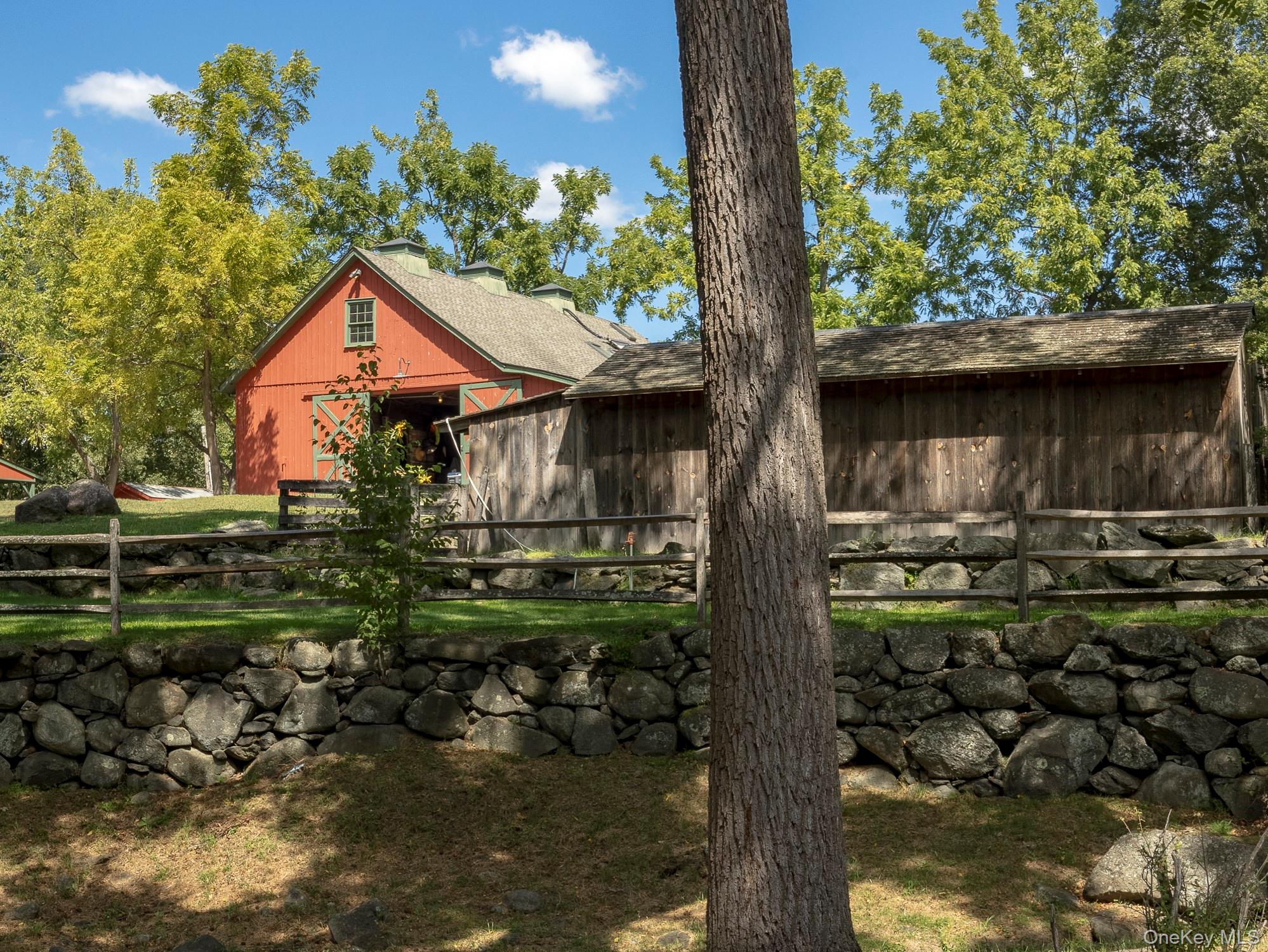 99 Quaker Bridge Road Croton-on-Hudson, NY 10520 - Photo 47 of 50 a front view of a house with garden