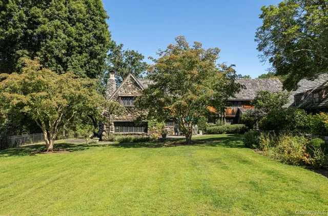 a view of outdoor space with deck and tree