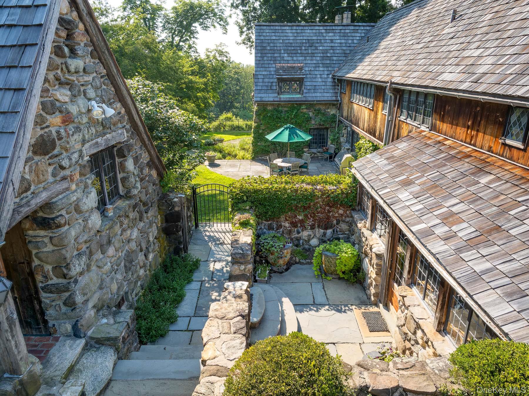 99 Quaker Bridge Road Croton-on-Hudson, NY 10520 - Photo 9 of 50 a view of a patio in backyard