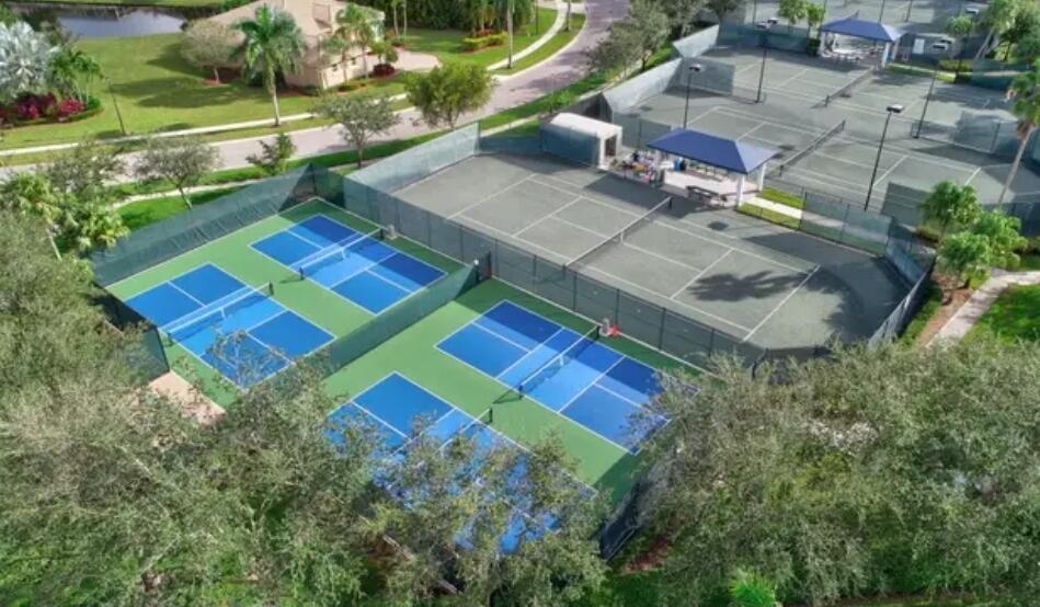 9770 Bowline Drive, Unit 102 West Palm Beach, FL 33411 - Photo 24 of 27 an aerial view of a house with a yard