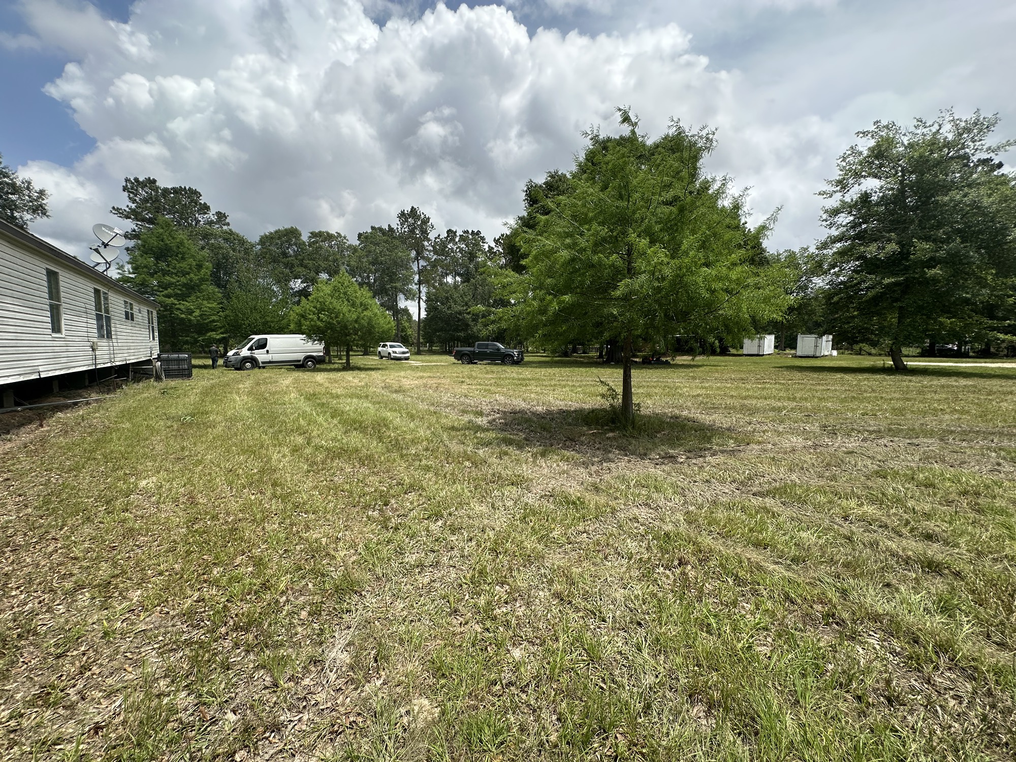 2229 Meekins Road Cleveland, TX 77328 - Photo 41 of 48 a view of outdoor space with deck and yard