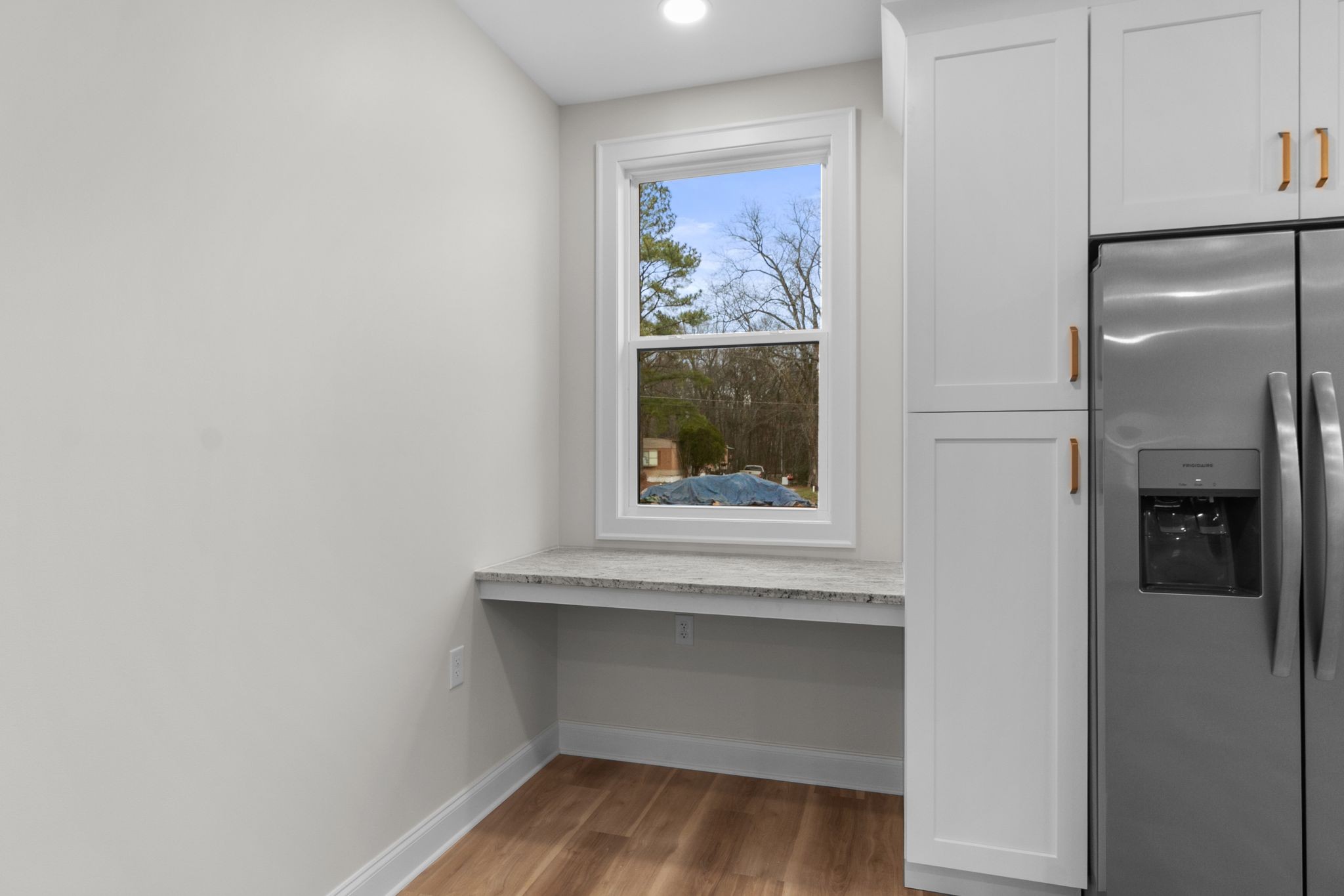 14 Warren Street Paris, TN 38242 - Photo 11 of 27 a view of a room with wooden floor and cabinet