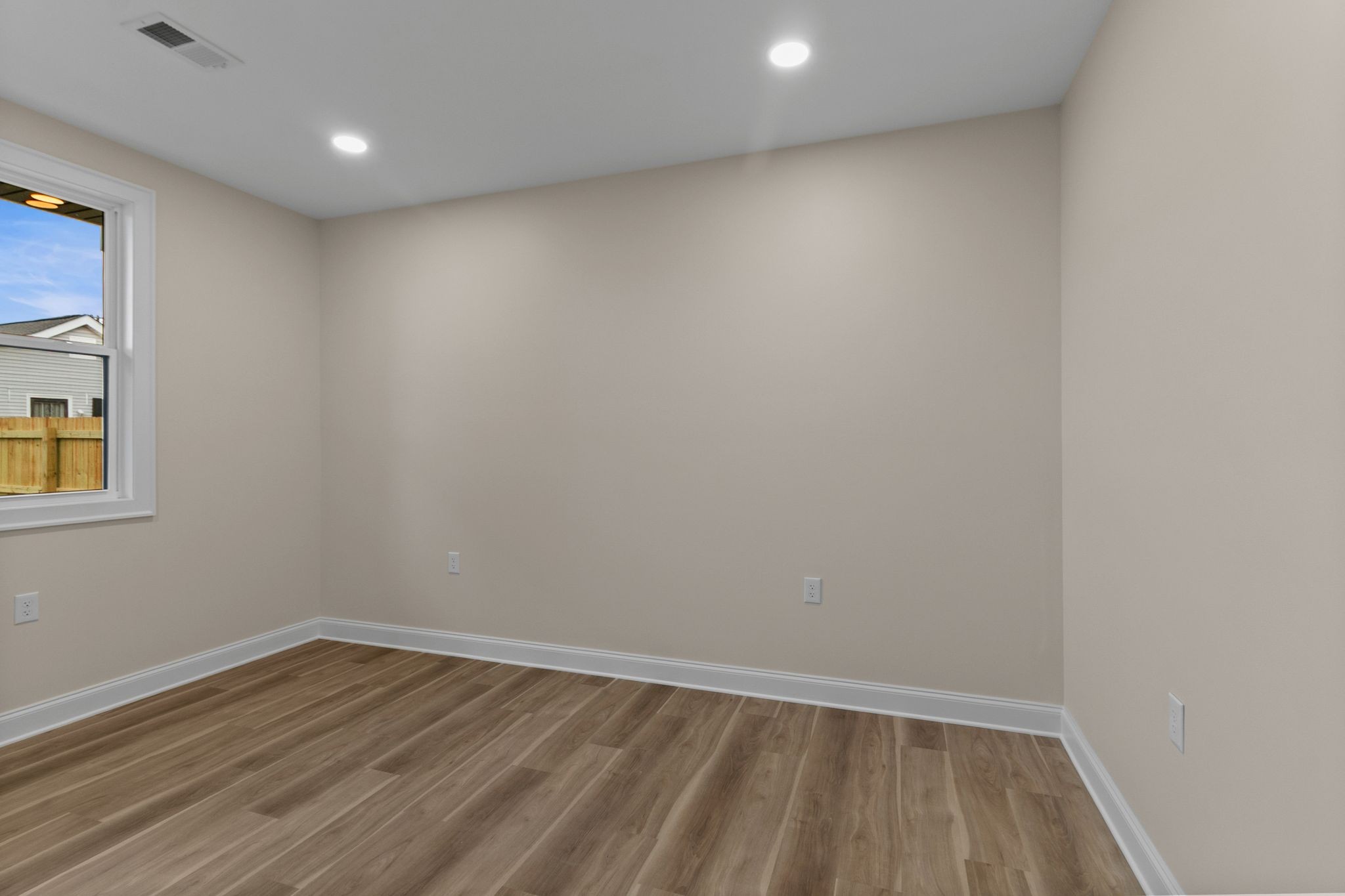 14 Warren Street Paris, TN 38242 - Photo 17 of 27 a view of room with wooden floor and fan