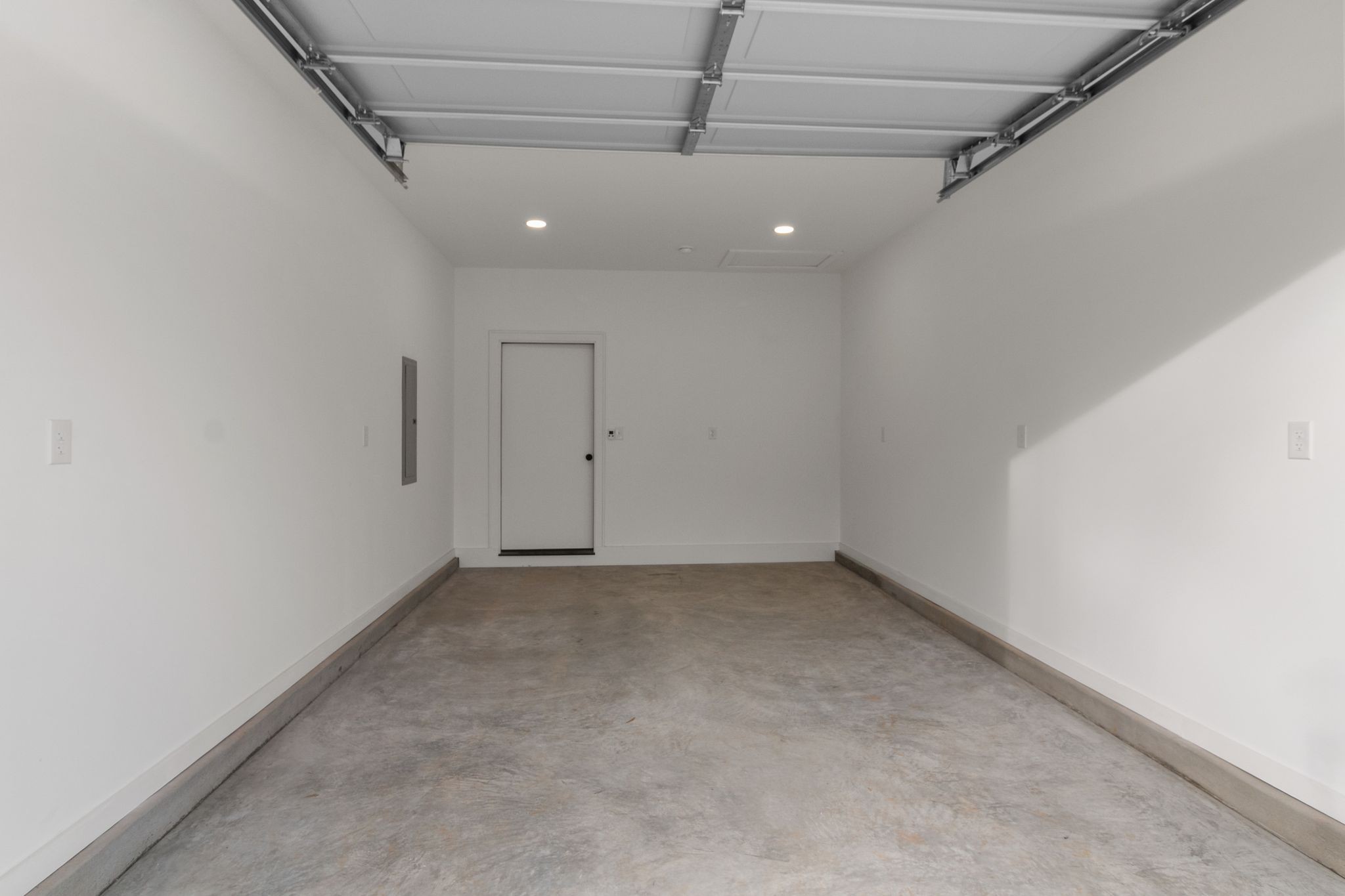 14 Warren Street Paris, TN 38242 - Photo 22 of 27 an empty room with a ceiling fan and window