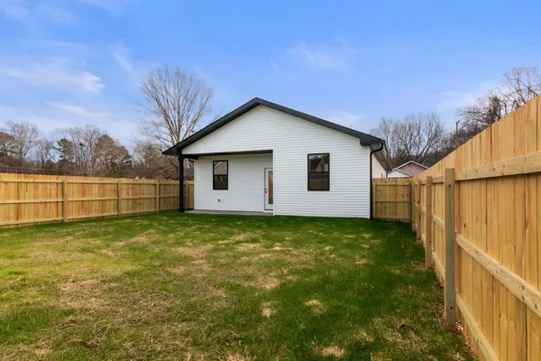 a view of a backyard with a garden