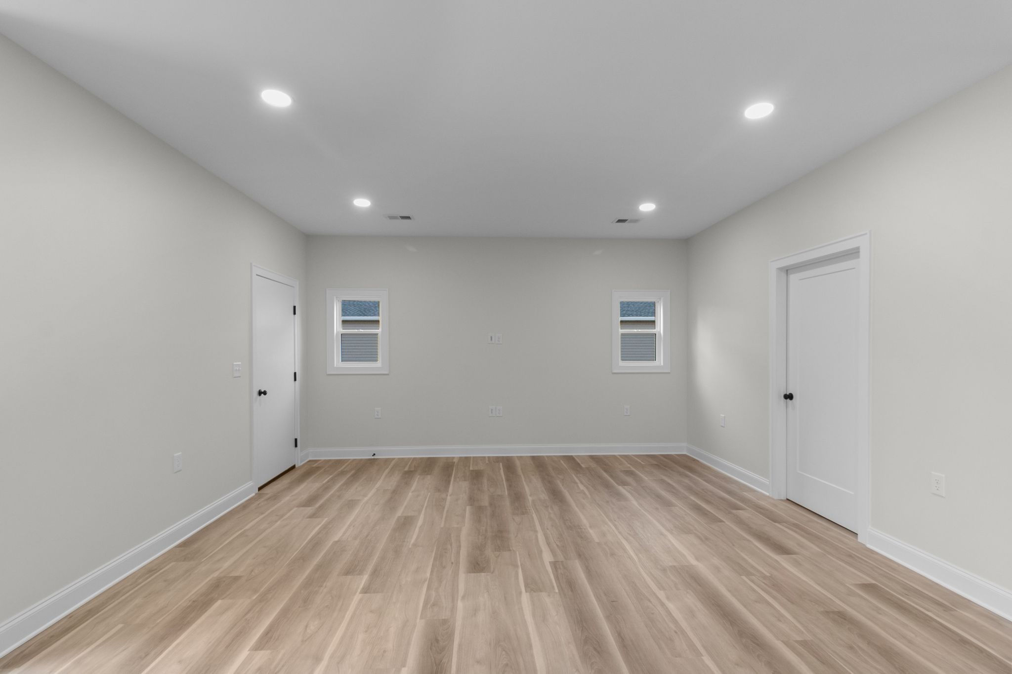 14 Warren Street Paris, TN 38242 - Photo 6 of 27 a view of room with window and wooden floor