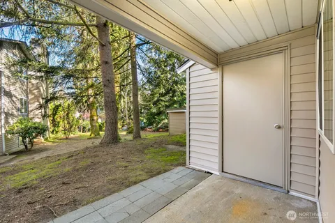 a view of a yard with an outdoor space