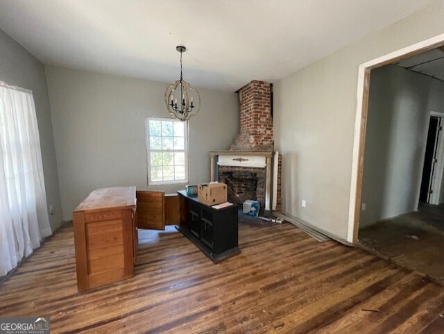 6070 Riggins Mill Road Dry Branch, GA 31020 - Photo 3 of 19 a living room with furniture and a fireplace