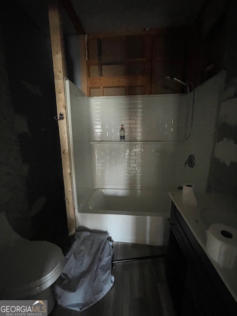 6070 Riggins Mill Road Dry Branch, GA 31020 - Photo 7 of 19 a bathroom with a bathtub and a shower