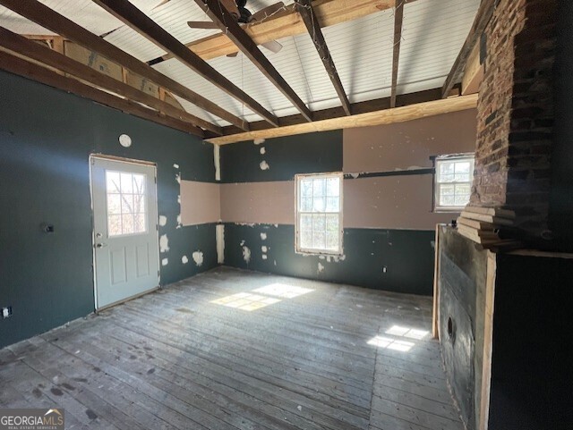 6070 Riggins Mill Road Dry Branch, GA 31020 - Photo 8 of 19 a view of a livingroom with a kitchen