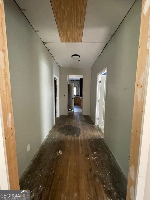 6070 Riggins Mill Road Dry Branch, GA 31020 - Photo 9 of 19 a view of a hallway to a room with a fireplace