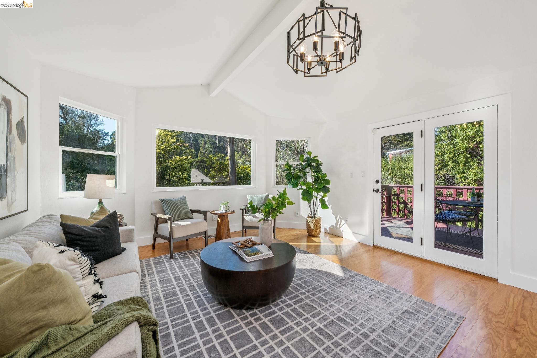6507 Heather Ridge Way Oakland, CA 94611 - Photo 1 of 1 a living room with furniture and a window