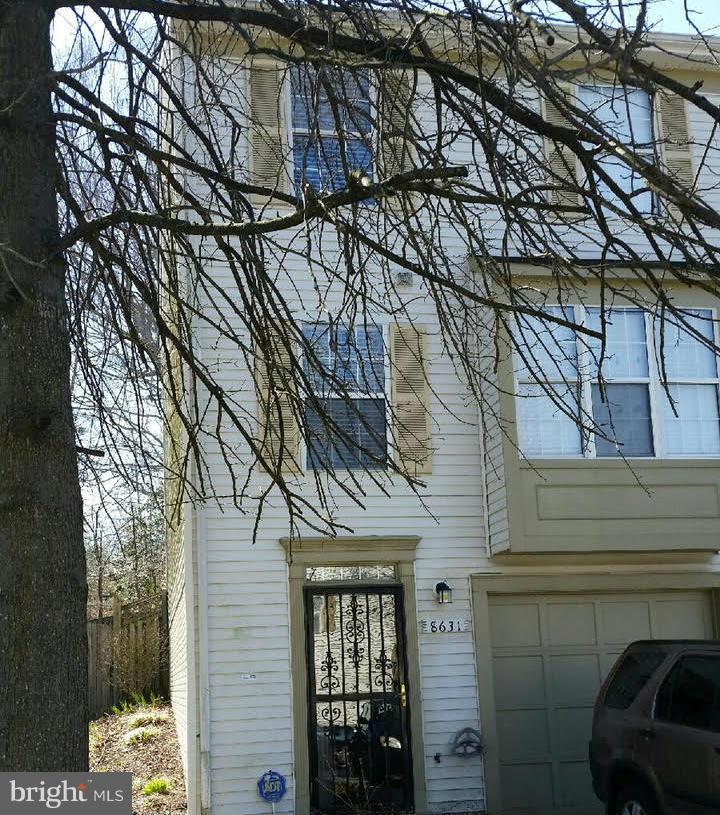8631 Ritchboro Road District Heights, MD 20747 - Photo 11 of 11 a view of a house with a large tree