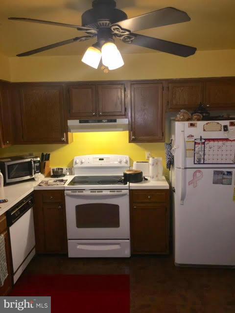 8631 Ritchboro Road District Heights, MD 20747 - Photo 3 of 11 a view of a kitchen with a sink and dishwasher