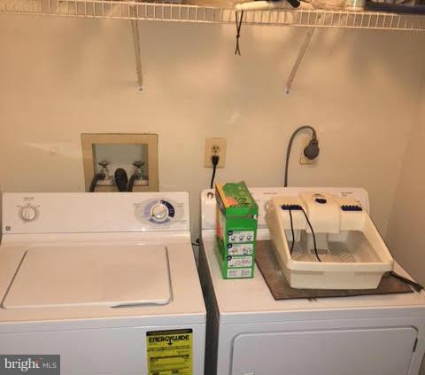 8631 Ritchboro Road District Heights, MD 20747 - Photo 9 of 11 a utility room with dryer and washer