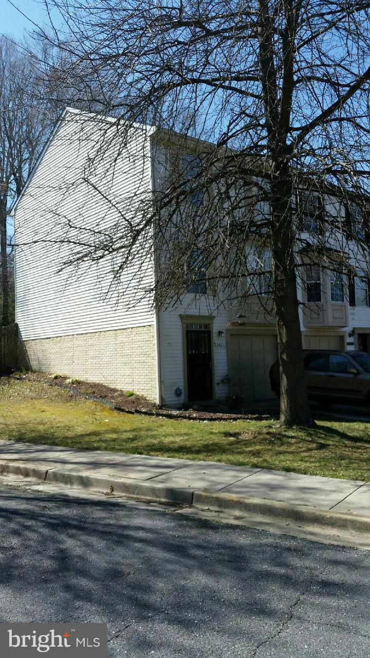 8631 Ritchboro Road District Heights, MD 20747 - Photo 10 of 11 a view of a house with a yard