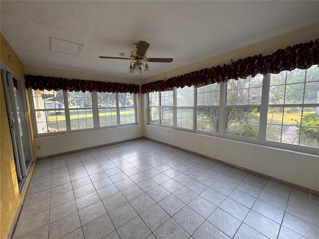 5440 Southwest 100th Loop Ocala, FL 34476 - Photo 26 of 37 a view of an empty room with a window