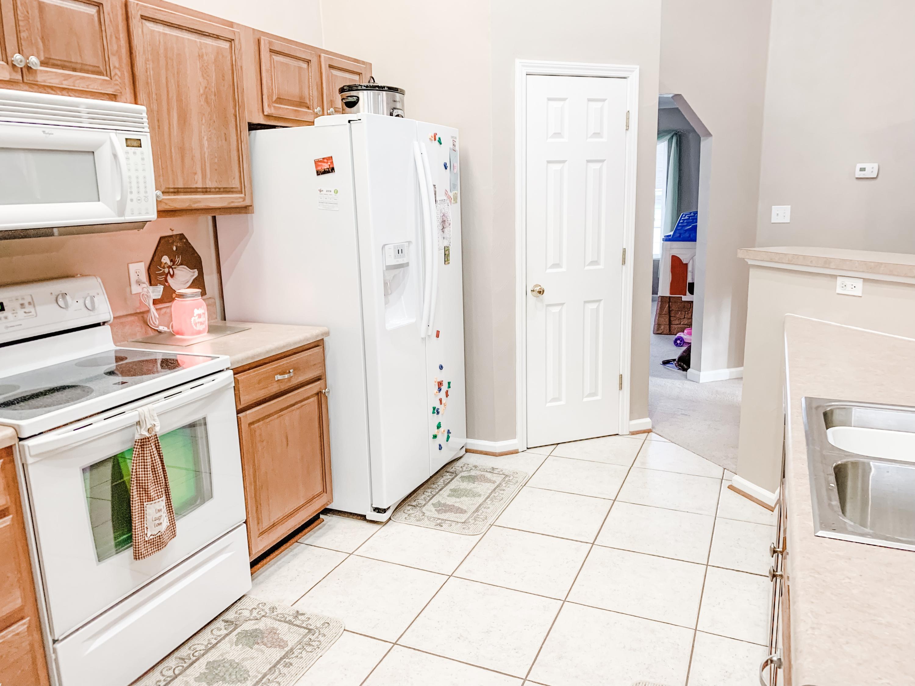 4242 Daugherty Road Salem, VA 24153 - Photo 16 of 40 a kitchen with stainless steel appliances a refrigerator and cabinets