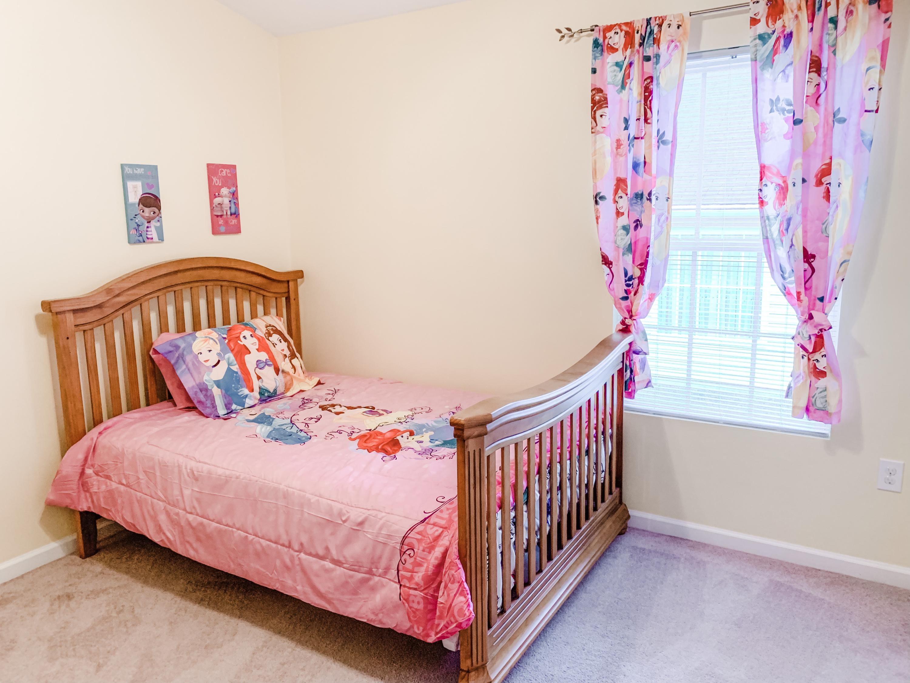4242 Daugherty Road Salem, VA 24153 - Photo 24 of 40 a bedroom with a bed and a couch