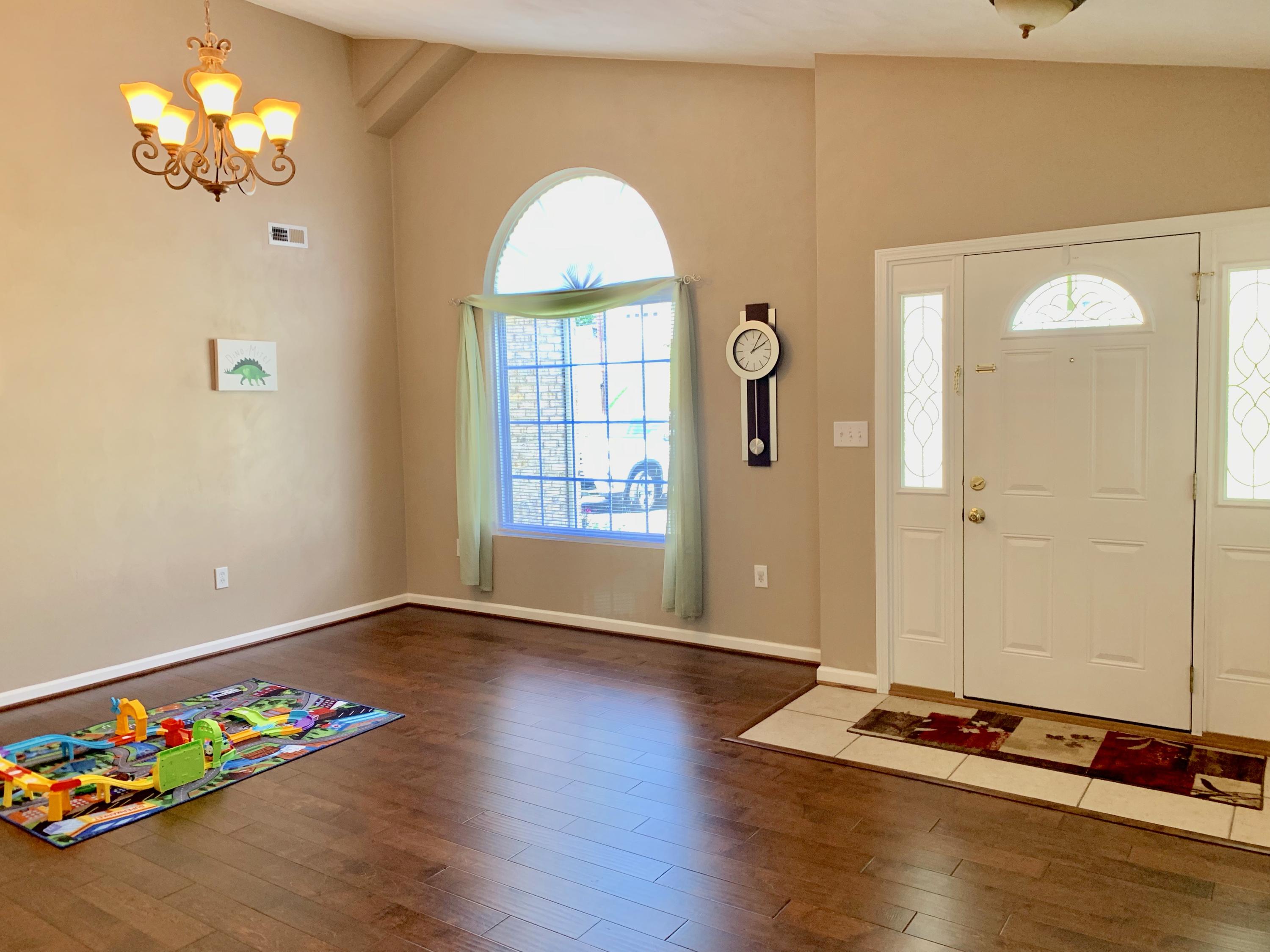 4242 Daugherty Road Salem, VA 24153 - Photo 7 of 40 an empty room with wooden floor and window