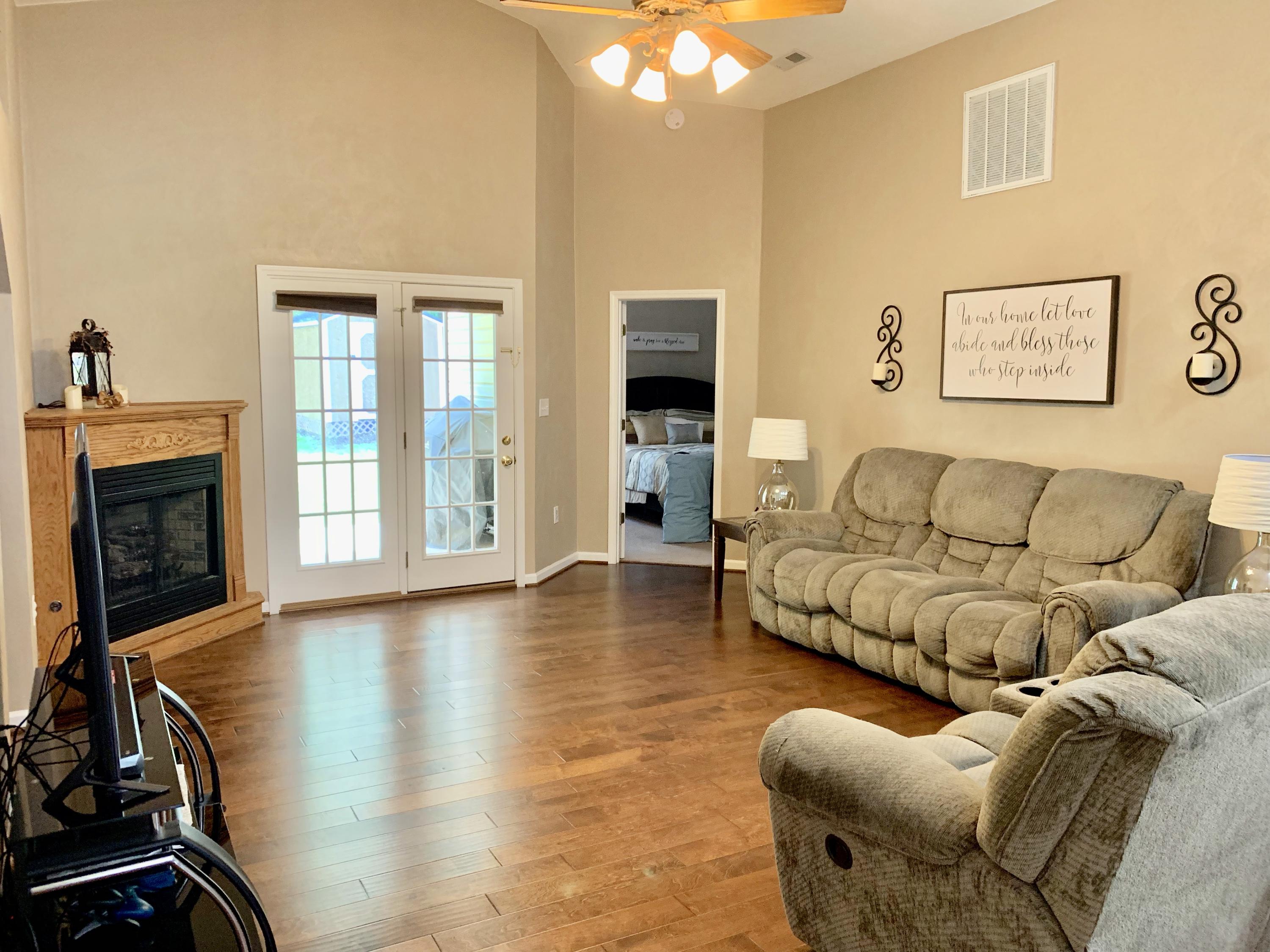 4242 Daugherty Road Salem, VA 24153 - Photo 10 of 40 a living room with furniture and a fireplace