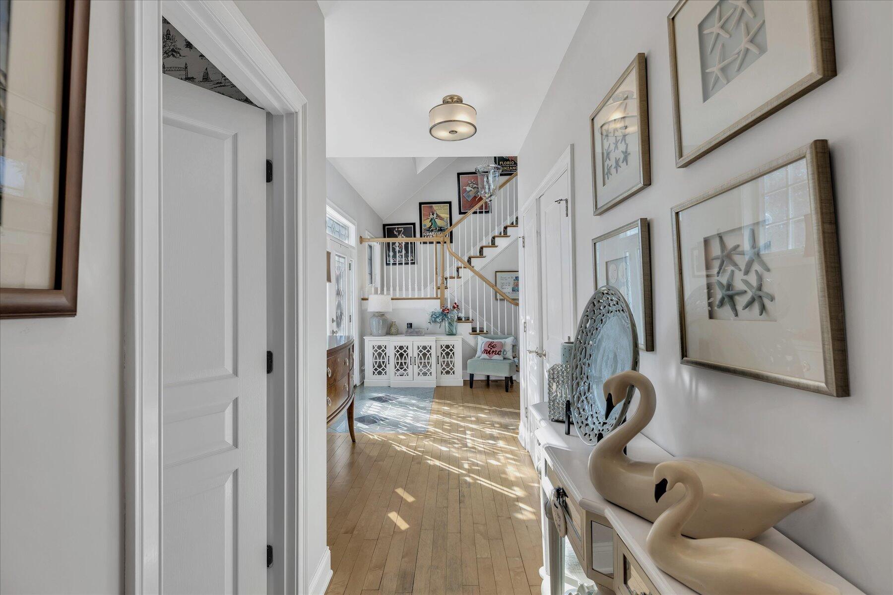 77 The Heights Mashpee, MA 02649 - Photo 19 of 52 a view of entryway and hall with wooden floor