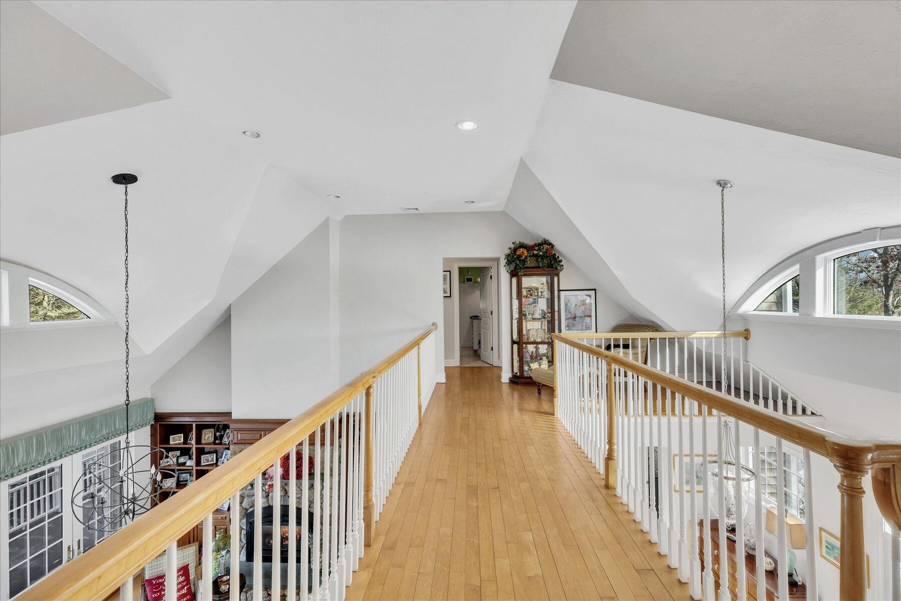 77 The Heights Mashpee, MA 02649 - Photo 25 of 52 a view of staircase with railing and wooden floor
