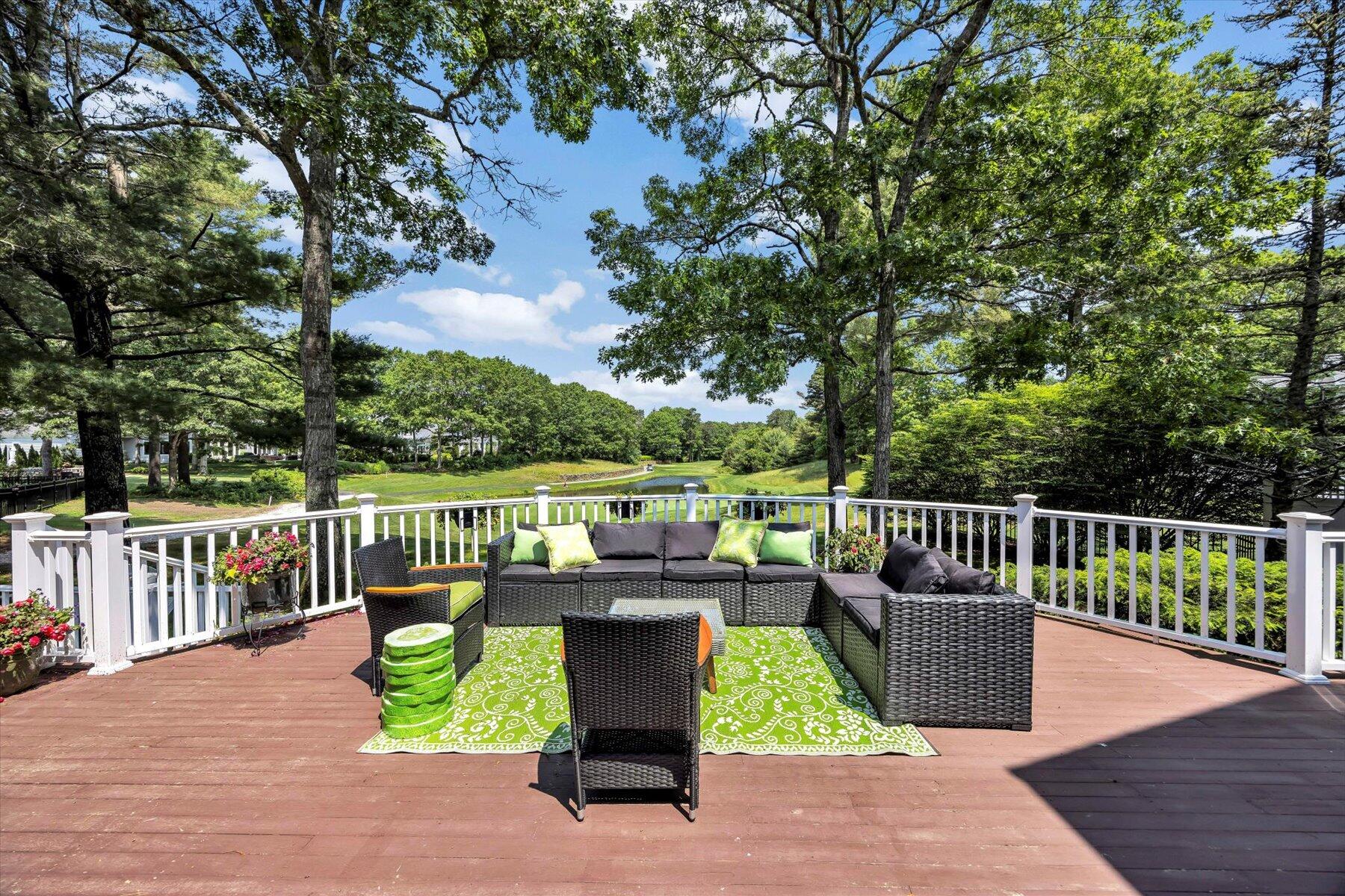 77 The Heights Mashpee, MA 02649 - Photo 39 of 52 a view of a chair and tables