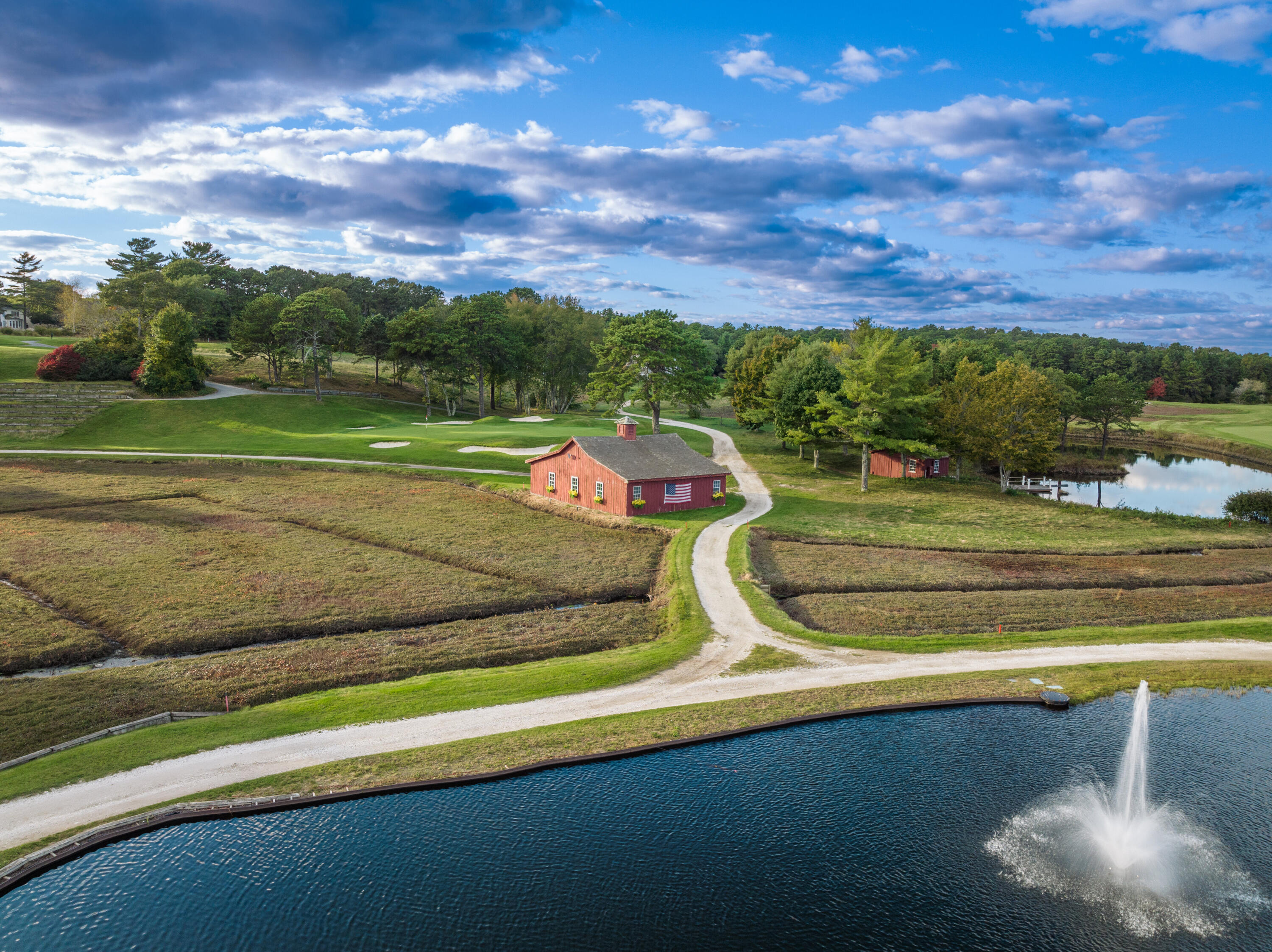 77 The Heights Mashpee, MA 02649 - Photo 51 of 52 a view of a golf course with a swimming pool