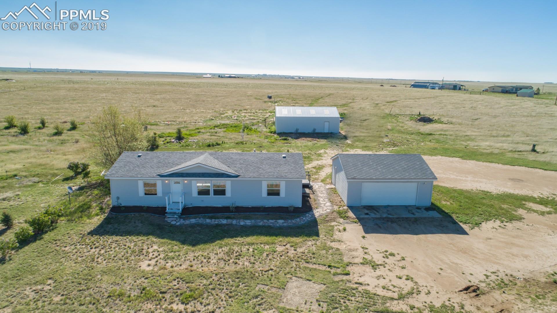 3725 South Calhan Road Calhan, CO 80808 - Photo 1 of 11