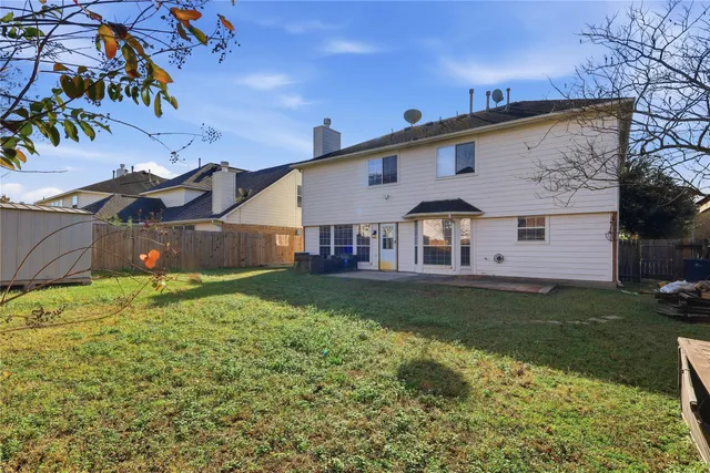 a house view with a garden space