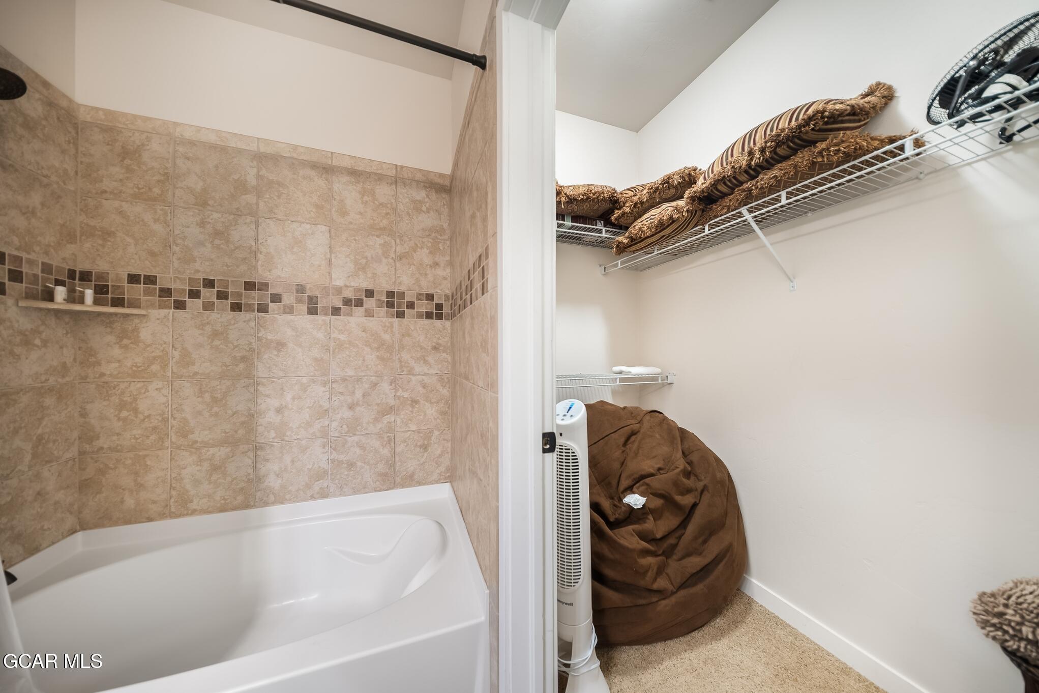 162 Village Road, Unit G303 Granby, CO 80446 - Photo 17 of 37 a bathroom with a tub