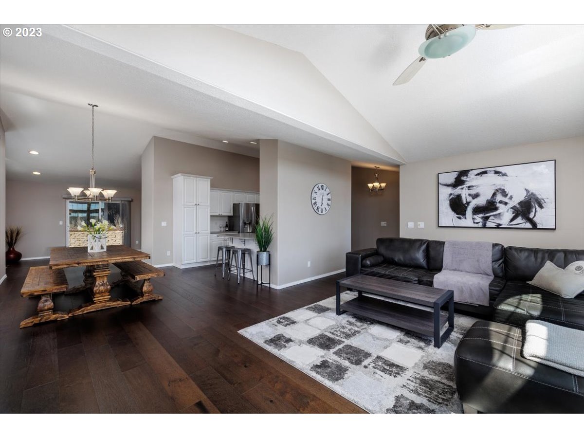 15855 Southwest Colyer Way Portland, OR 97224 - Photo 11 of 37 a living room with furniture and wooden floor