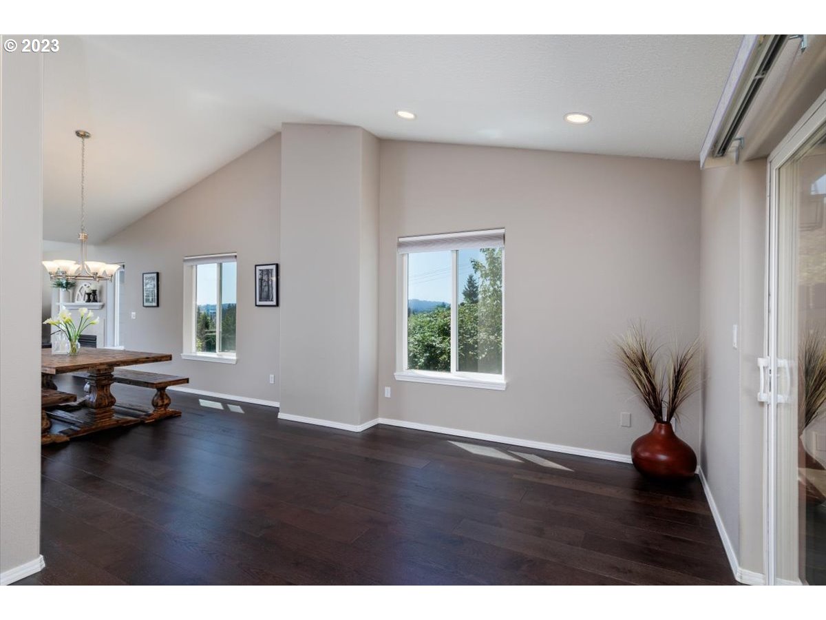 15855 Southwest Colyer Way Portland, OR 97224 - Photo 18 of 37 a view of an empty room with wooden floor and a window