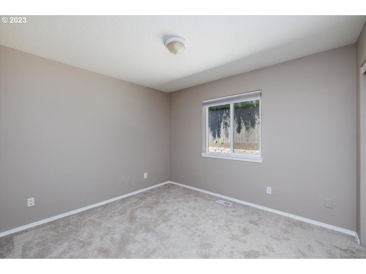 15855 Southwest Colyer Way Portland, OR 97224 - Photo 25 of 37 a view of an empty room with a window