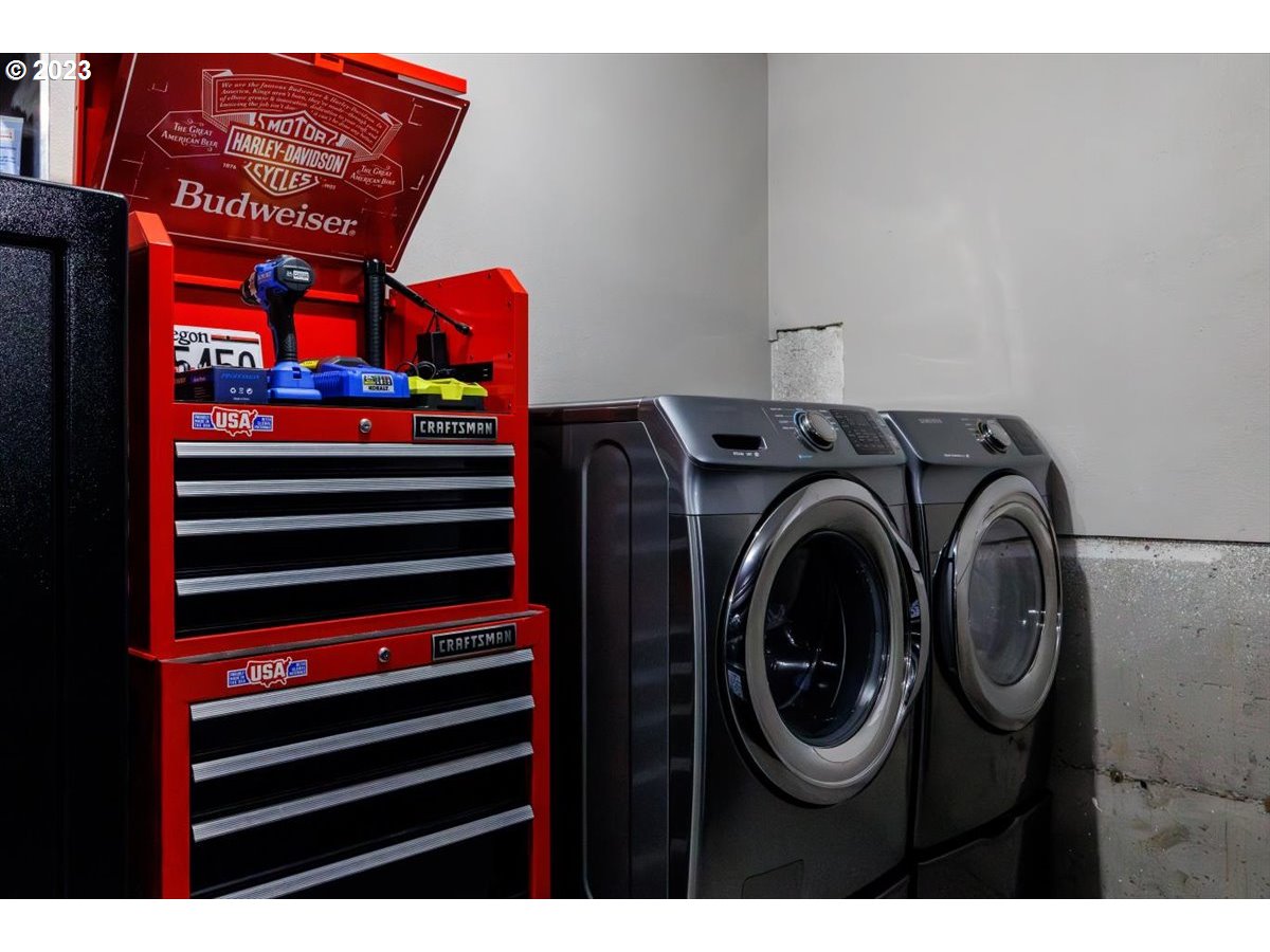 15855 Southwest Colyer Way Portland, OR 97224 - Photo 29 of 37 a utility room with dryer and washer