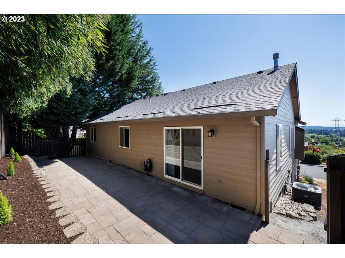 15855 Southwest Colyer Way Portland, OR 97224 - Photo 30 of 37 a view of a house with a backyard
