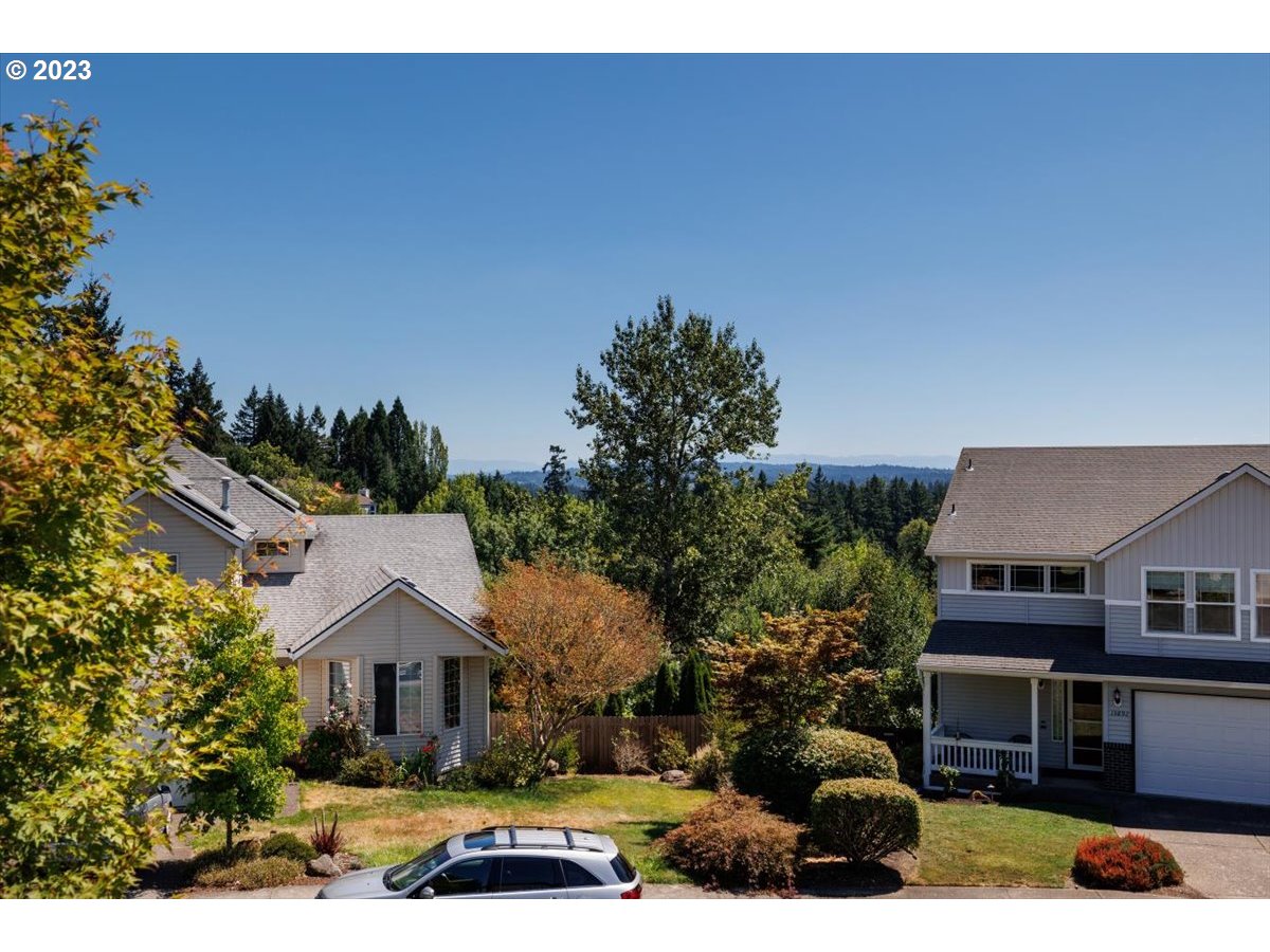 15855 Southwest Colyer Way Portland, OR 97224 - Photo 36 of 37 a front view of a house with a yard